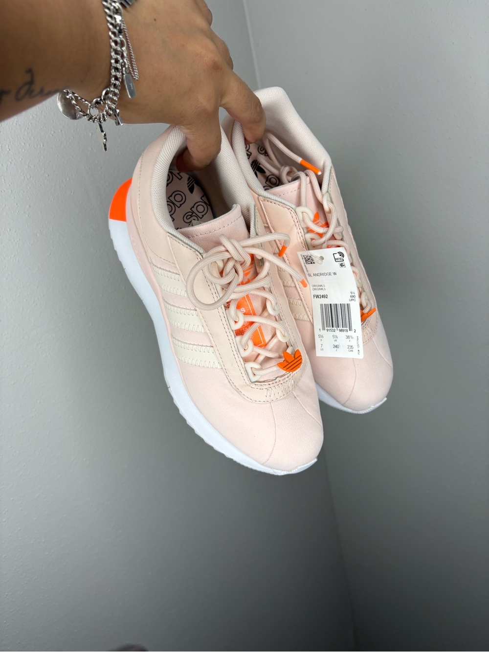 adidas Women’s Pale Pink Sneakers with Orange Accents